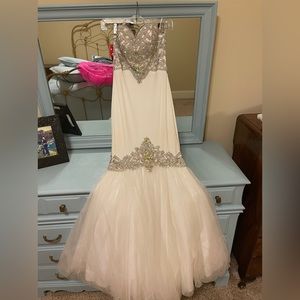 Selling this pageant dress!! Worn twice still in good condition!!